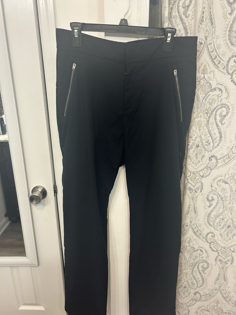 Black women’s yoga/joggers with  Zip-Front pockets.